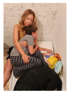 Donna and her son Guy, age 9, in bomb shelter in Israel