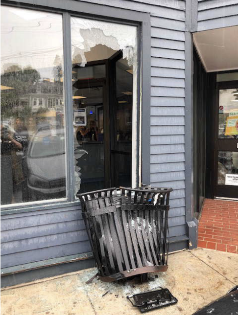 Trash can in front of bank